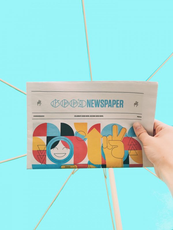 Investing in shares: Newspaper titled 
