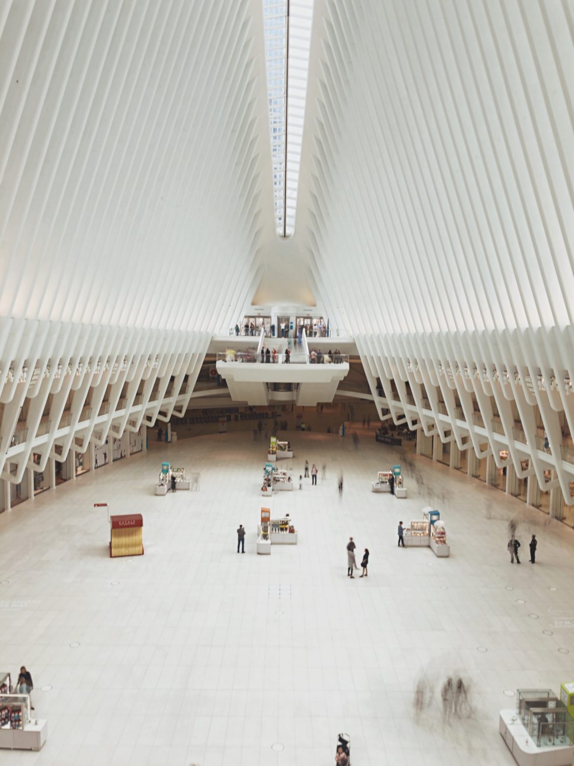 What is peer to Peer lending: A vast room in an architecturally stylish building with small groups of people milling about