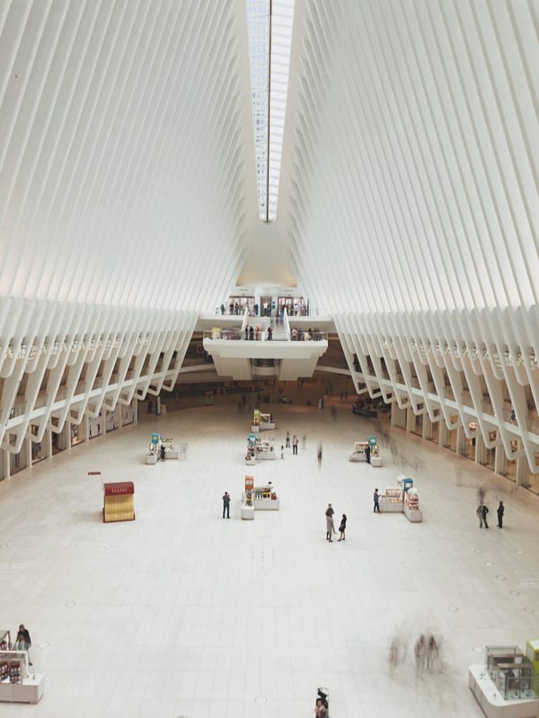 What is peer to Peer lending: A vast room in an architecturally stylish building with small groups of people milling about