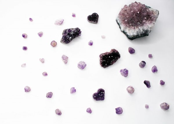 What is a diamond: Types of diamonds, A selection of gemstones arranged against a white background