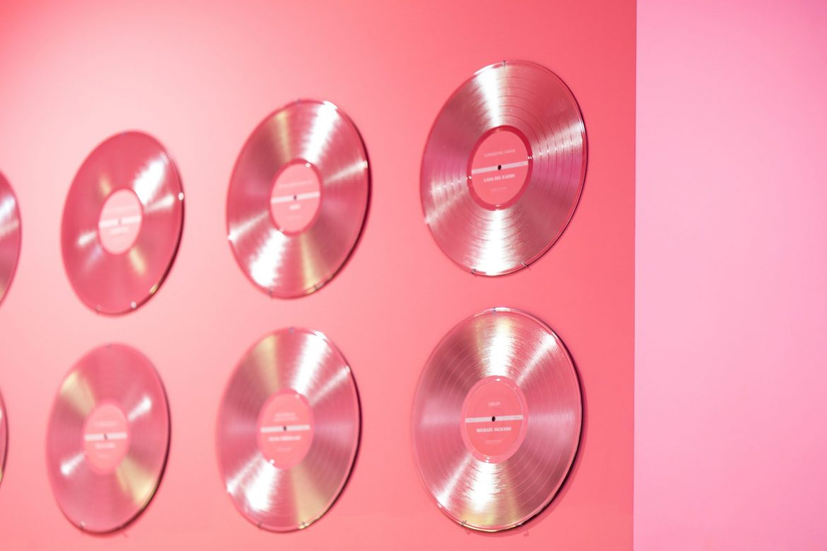 Uses of platinum: a set platinum discs mounted against a pink backdrop