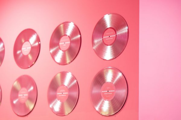 Uses of platinum: a set platinum discs mounted against a pink backdrop