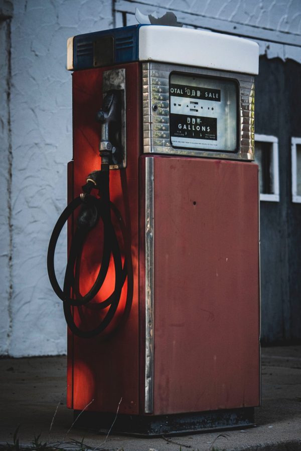Oil exploration:Vintage petrol fuel pump in red