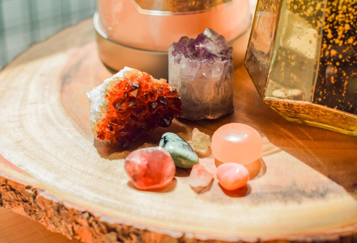 Kodal Minerals (LSE:KOD) Share Price News: A number of different shaped crystals displayed on a table