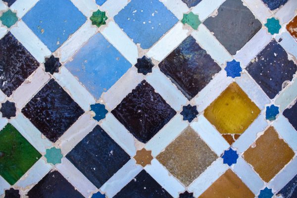 Diamond mining: Multi-coloured tiles placed on a wall in a diamond pattern