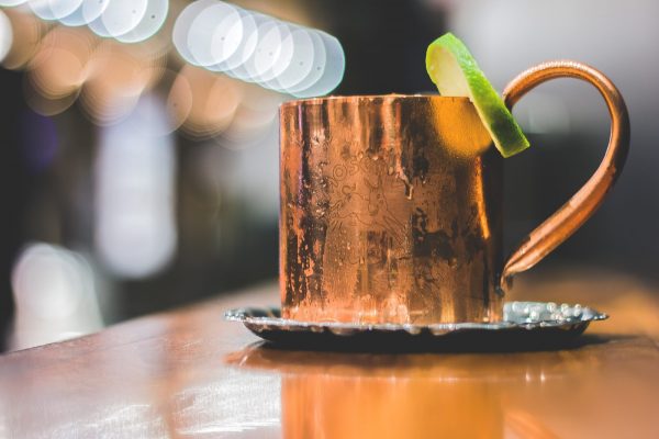 Investing in copper: copper mug placed on a cafe table